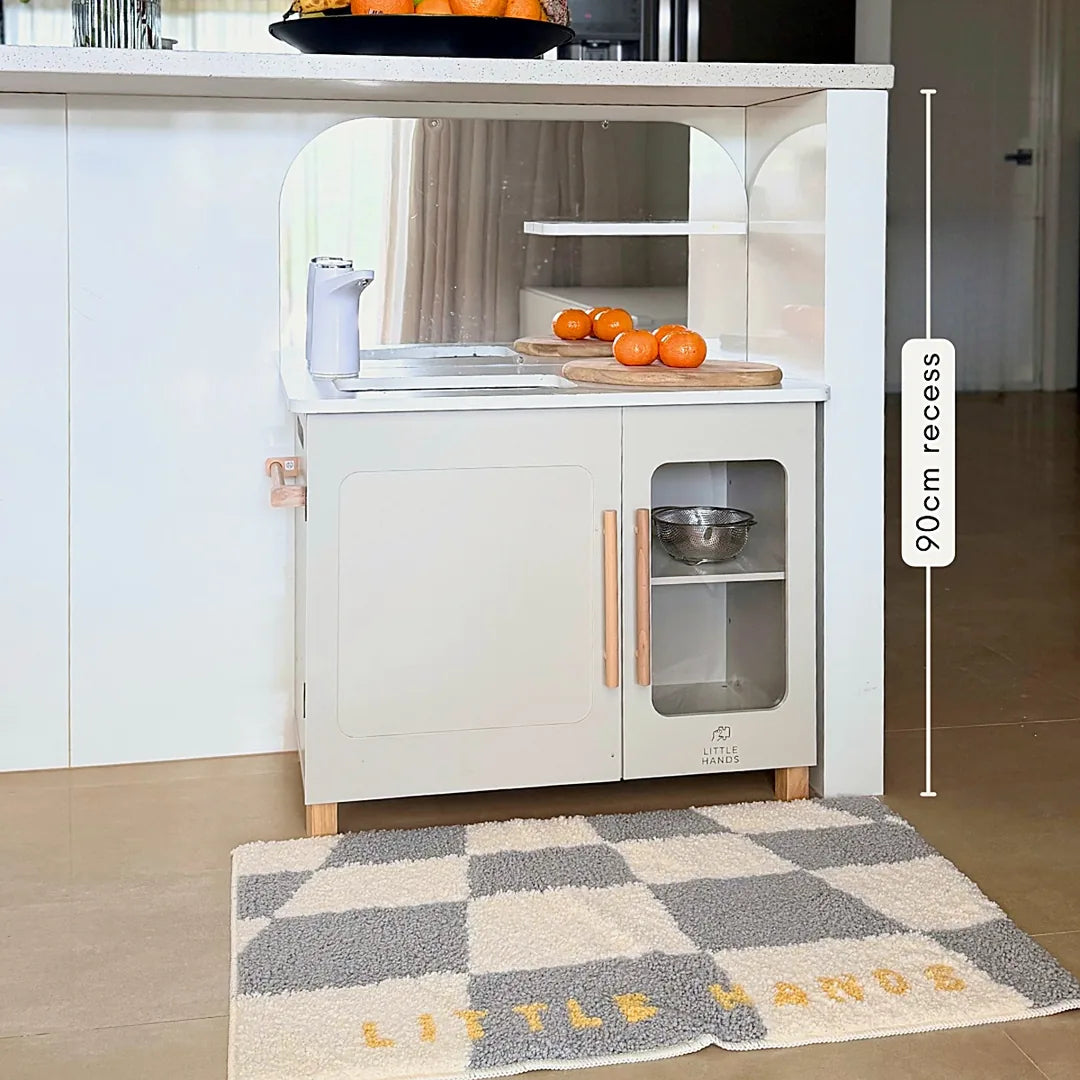 The Little Kitchen tucked under a 90 cm high island bench recess